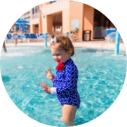 toddler plays in the pool at our kid-friendly resort in Florida