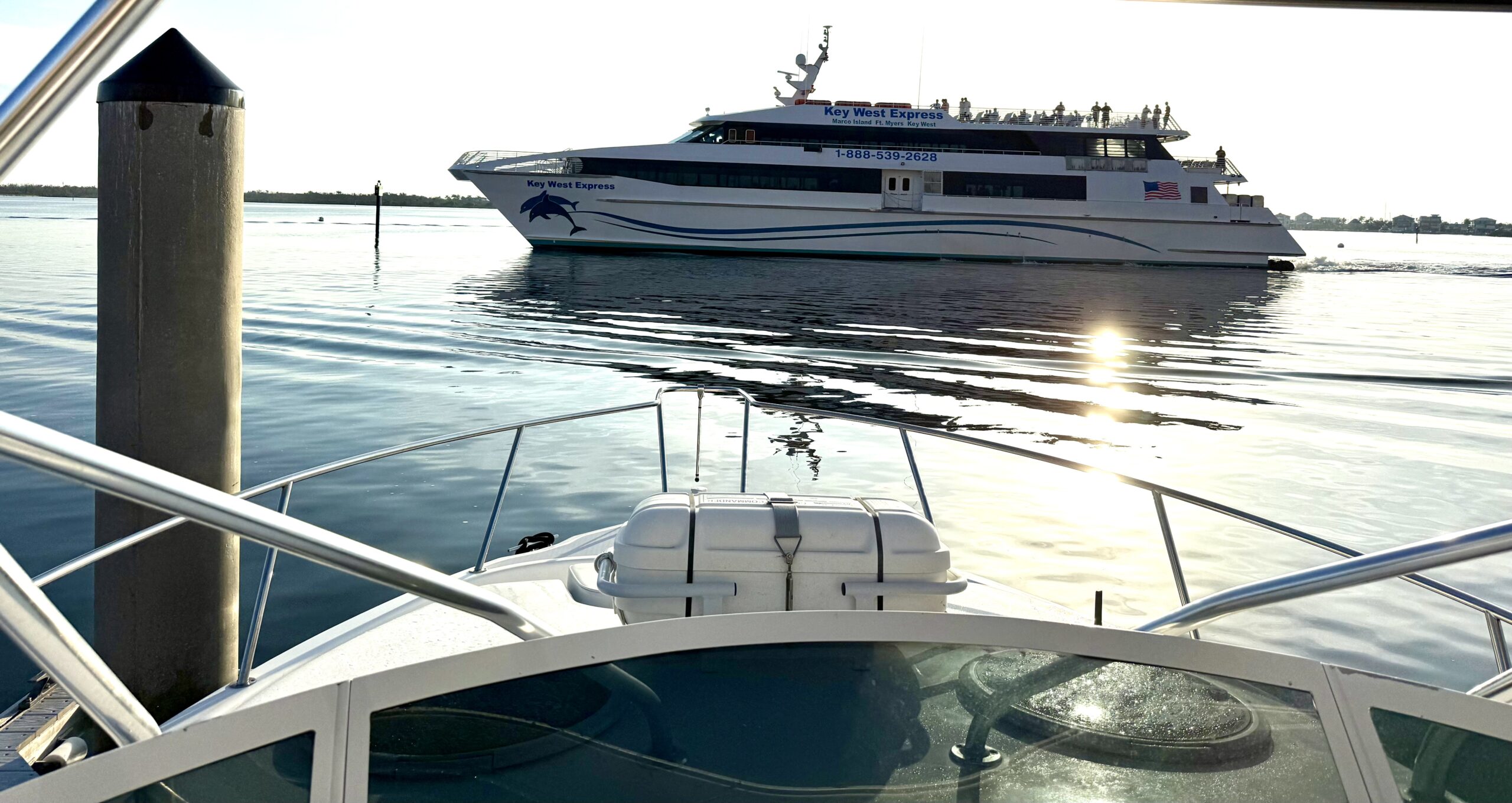 A large passenger ferry labeled 